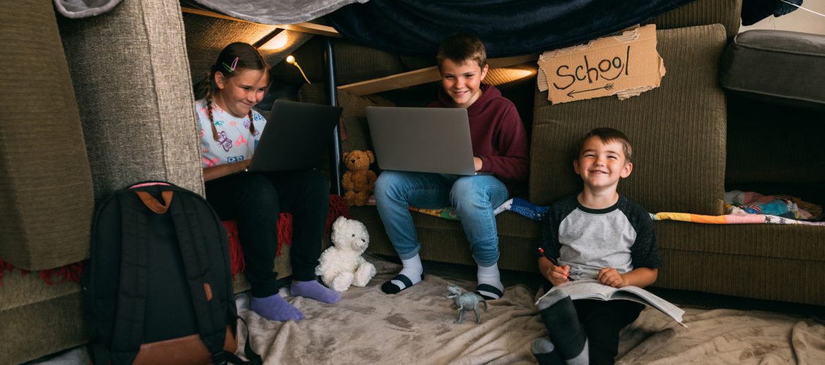 Lockdown: Children Homeschooling in a Couch Fort